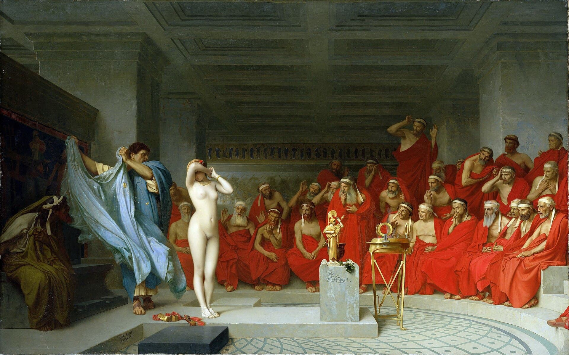 Jean-Léon Gérôme, Phryne przed Areopagiem, 1861 — naga jasnowłosa kobieta stoi na kamiennym podeście i zasłania twarz oboma przedramionami, a stojący obok mężczyzna w niebieskim płaszczu trzyma wysoko zdjętą z niej błękitną szatę. Naprzeciw, na rzędach ław, tłoczy się kilkudziesięciu starszych mężczyzn w czerwonych togach i białych opaskach na głowach; jedni wychylają się do przodu, inni zasłaniają twarze dłońmi, a jeden w głębi zerwał się z miejsca z uniesionymi rękami.