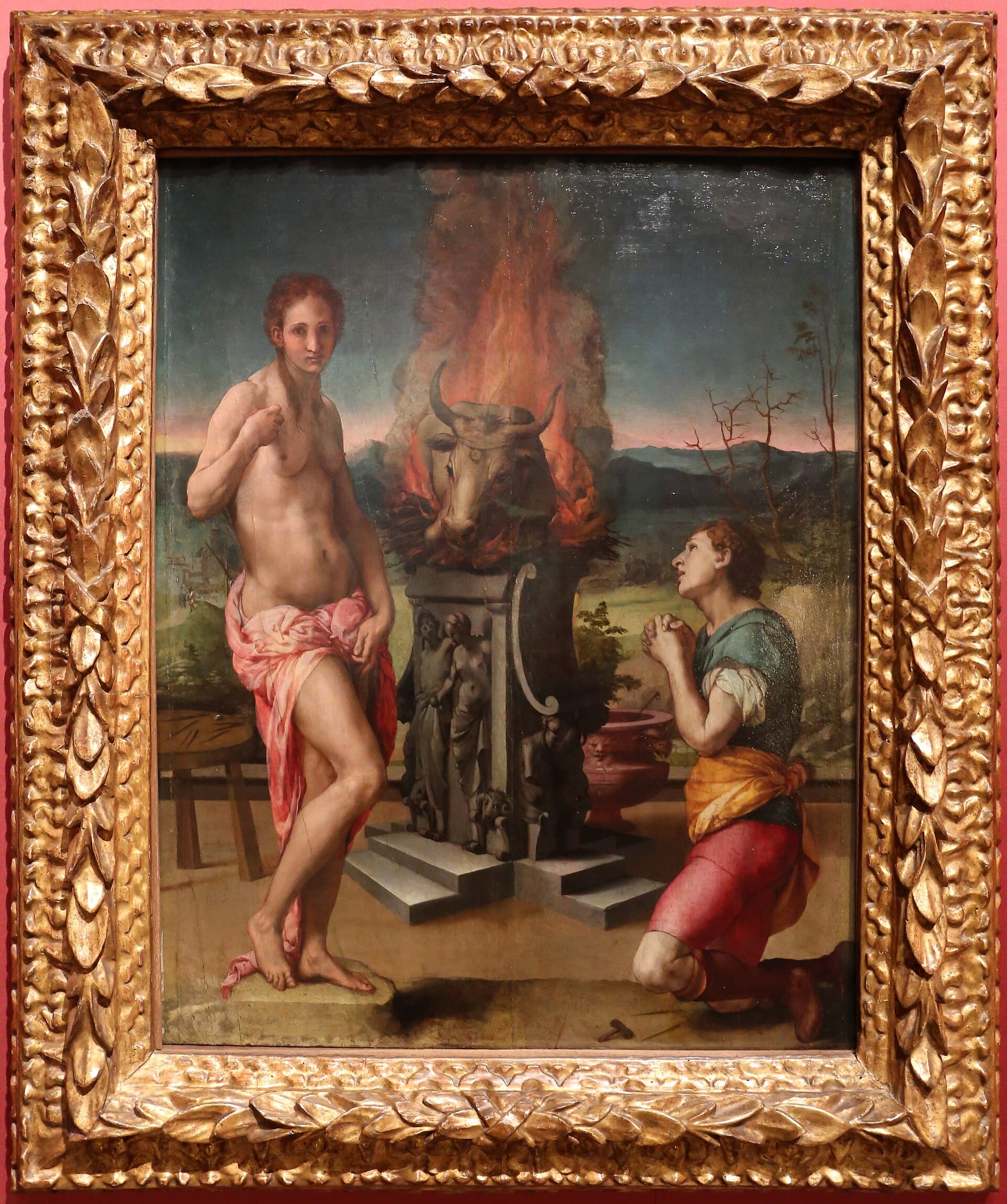 Agnolo Bronzino, Pigmalion i Galatea, ok. 1530, olej - po lewej naga kobieta w różowej draperii stoi na niskim cokole, pośrodku kamienny ołtarz z płonącym ogniem i głową wołu, po prawej klęczy mężczyzna ze złożonymi dłońmi, na ziemi leżą młotek i dłuto
