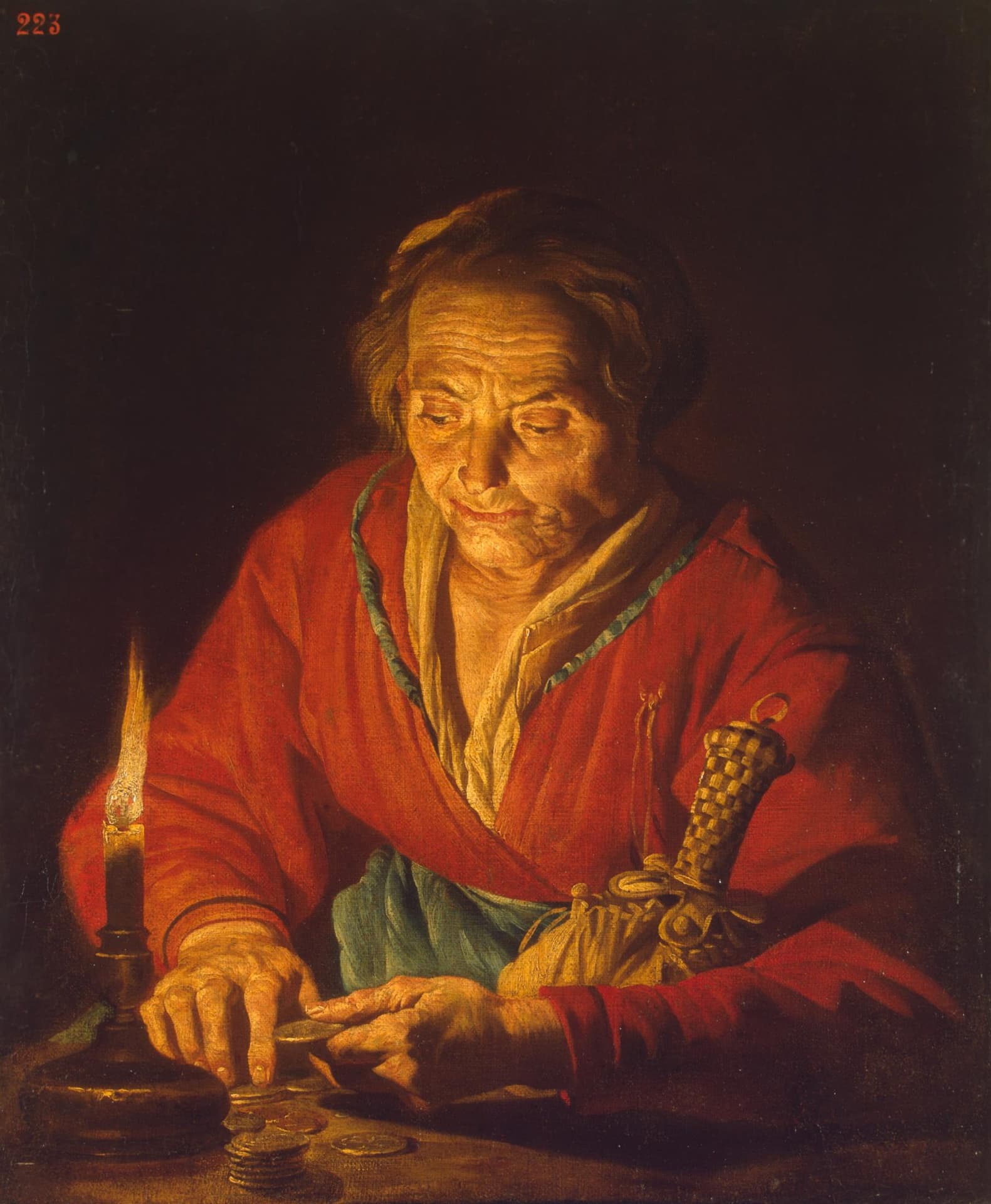 Matthias Stom, Stara kobieta ze świecą (XVII w.) — ciemne wnętrze oświetlone wyłącznie cienką świecą, która stoi po lewej stronie w mosiężnym lichtarzu na stole. Stara kobieta w czerwonej sukni i zielonej przepasce pochyla się nad blatem i palcami układa stosiki złotych monet, a u pasa ma zawieszoną sakiewkę i nóż o plecionej rękojeści.