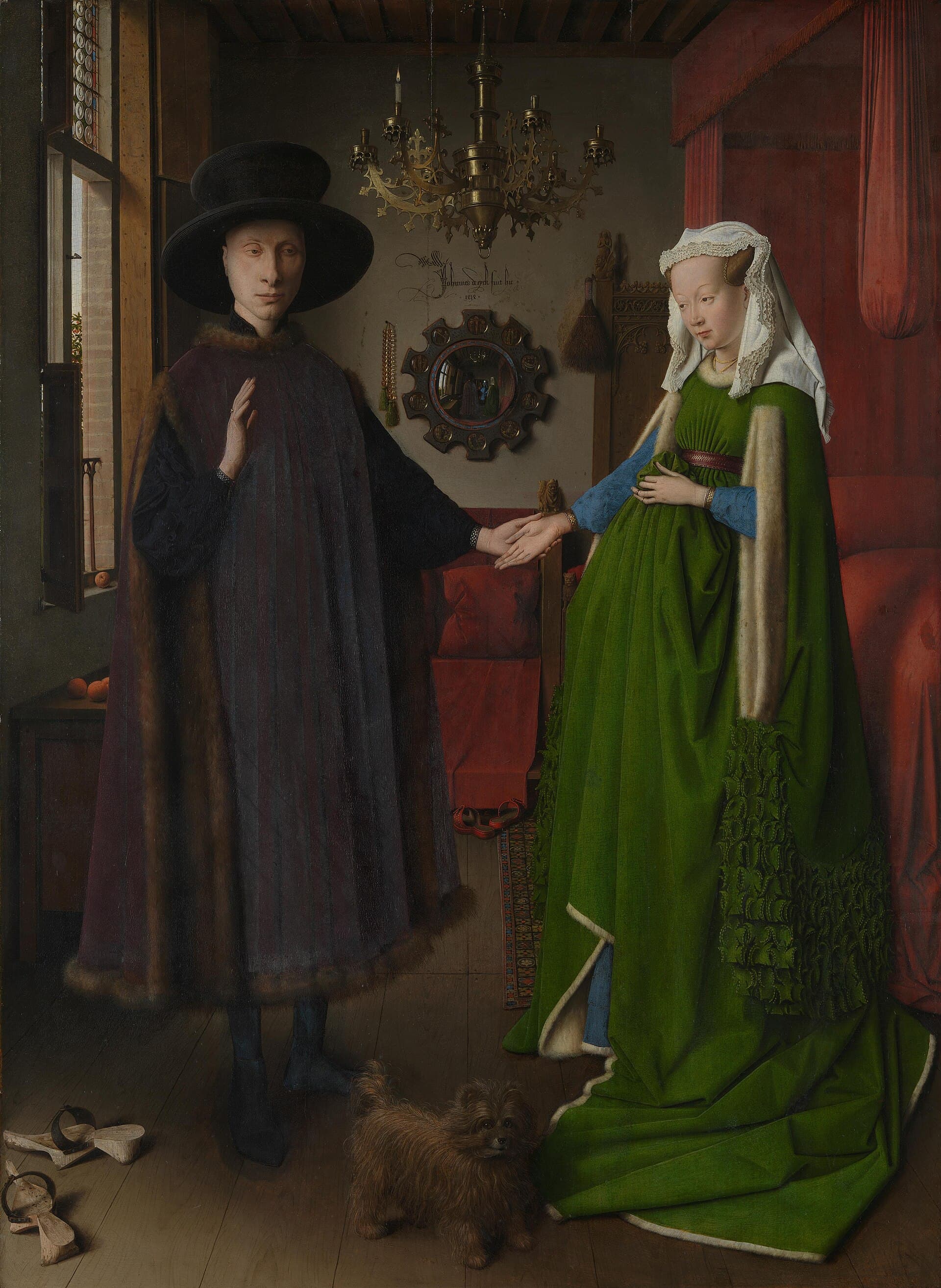 Jan van Eyck, Portret małżonków Arnolfinich 1434, National Gallery w Londynie — w mieszczańskiej sypialni mężczyzna w ciemnym płaszczu i kobieta w obszernej zielonej sukni stoją obok siebie, złączeni dłońmi; nad nimi wisi mosiężny żyrandol z jedną palącą się świecą, u ich stóp siedzi mały kudłaty pies, a na ścianie w głębi widnieje okrągłe wypukłe zwierciadło, w którym mieści się całe wnętrze widziane od tyłu razem z sylwetkami dwojga gości stojących tam, gdzie stoi patrzący