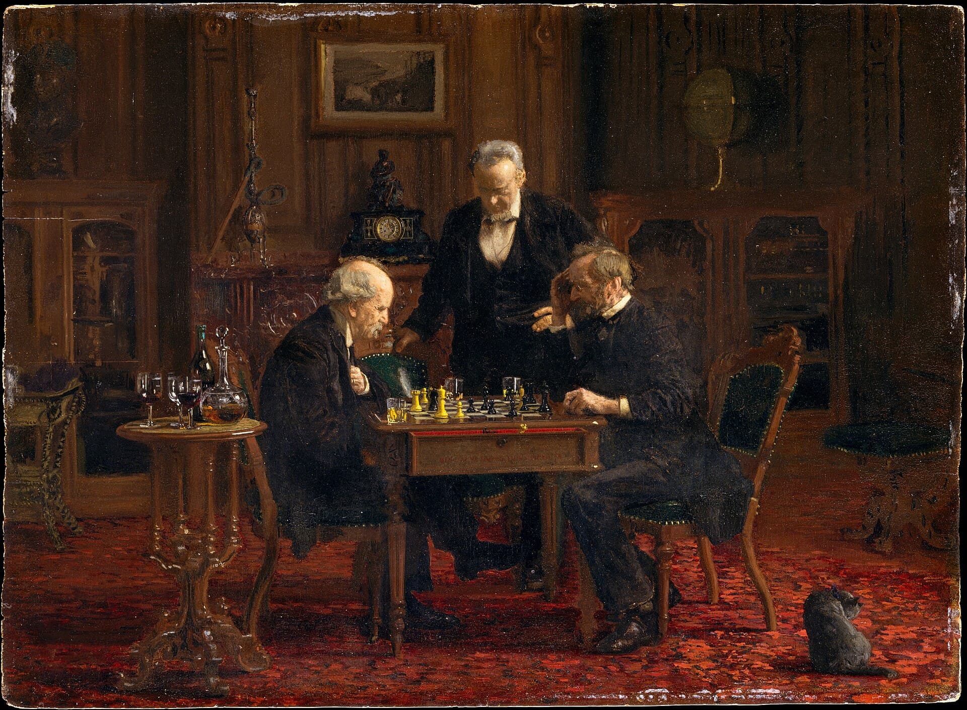 Thomas Eakins, Gracze w szachy, 1876, olej - dwóch starszych mężczyzn pochylonych nad szachownicą w ciemnym salonie, trzeci stoi między nimi i patrzy na planszę; w tle zegar kominkowy, obok stolik z karafką i kieliszkami, na czerwonym dywanie kot
