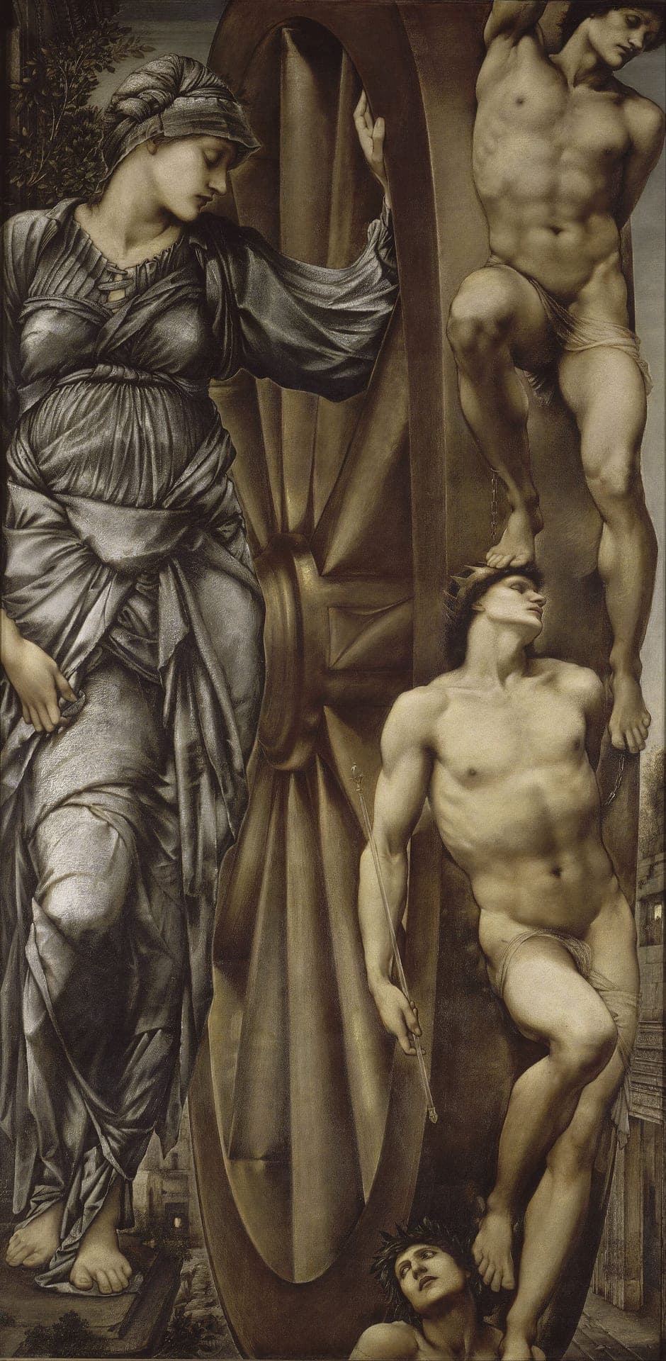 Edward Burne-Jones, Koło Fortuny, 1875-1883, olej na płótnie - wąskie, bardzo wysokie płótno, w którym wielkie drewniane koło nie mieści się w kadrze, obok stoi kobieta w ciemnej szacie ze spuszczonymi oczami i trzyma dłoń na obręczy, a do obręczy przywiązani są trzej nadzy mężczyźni, każdy na innej wysokości