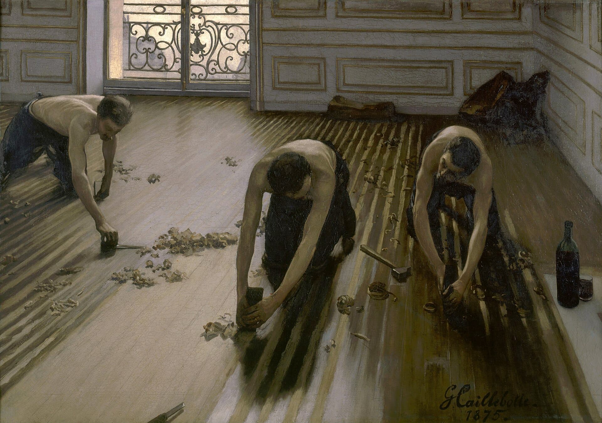 Gustave Caillebotte, Cykliniarze (1875) - trzej mężczyźni w niemal identycznej pozie skrobią parkiet