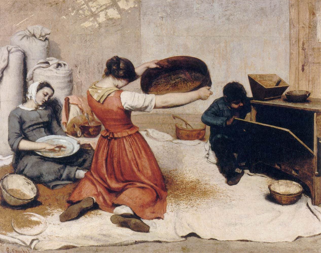 Gustave Courbet, Przesiewaczki zboża, 1854, Muzeum Sztuk Pięknych w Nantes — troje ludzi pracuje na białej płachcie rozłożonej na klepisku; w środku klęczy odwrócona tyłem kobieta w ceglastej sukni i podrzuca płaskie okrągłe sito pełne ziarna, z lewej druga kobieta w szarym ubraniu i białym czepku przebiera zboże na dużym talerzu, z prawej chłopiec w granatowym stroju kuca i zagląda do otwartej szuflady drewnianego młynka do czyszczenia ziarna; pod ścianą stoją napełnione worki, obok leżą drewniane chodaki i miski