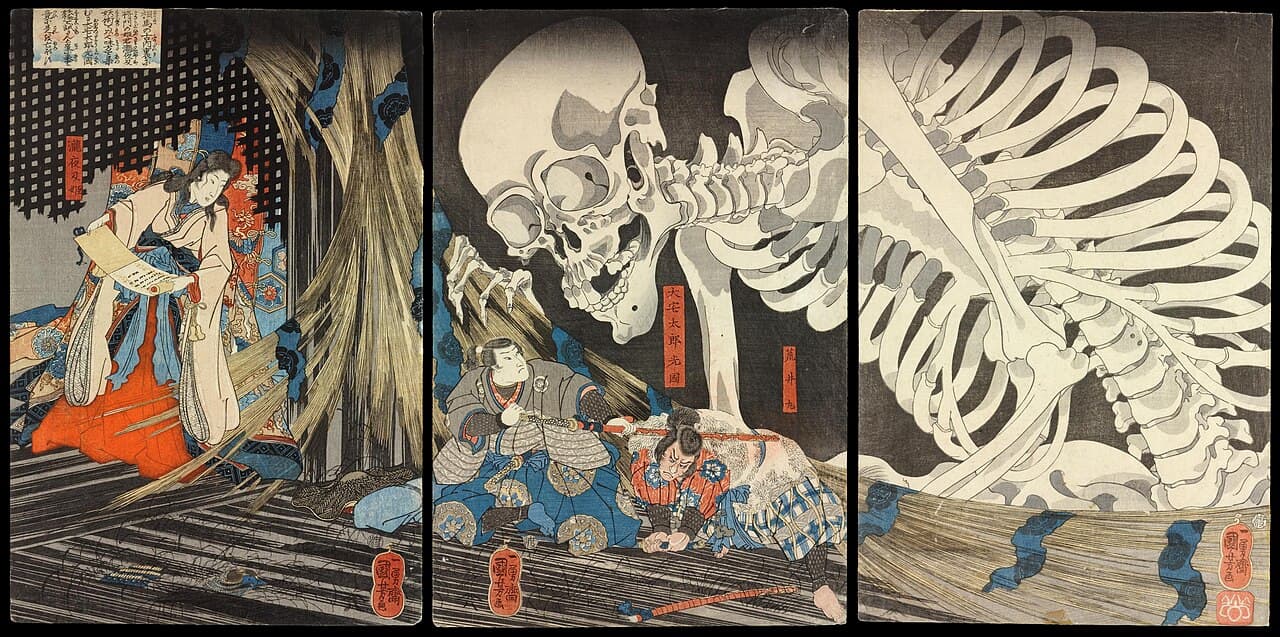 Utagawa Kuniyoshi, Czarownica Takiyasha i widmo szkieletu, ok. 1844, British Museum — barwny drzeworyt w trzech arkuszach: po lewej kobieta w białej szacie na czerwonym stroju rozwija zwój przy podartej bambusowej zasłonie, w środku ogromna czaszka z otwartą szczęką pochyla się nad dwoma mężczyznami w zbrojach, z których jeden dobywa miecza, po prawej żebra i kręgosłup szkieletu wypełniają cały arkusz na czarnym tle
